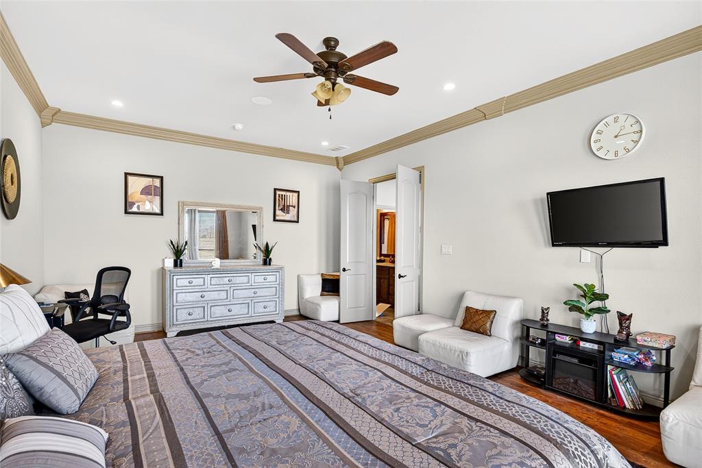 12099 Briargrove Lane Forney, TX 75126 - Photo 24 of 38 Bedroom with ornamental molding, ceiling fan, wood finished floors, and recessed lighting