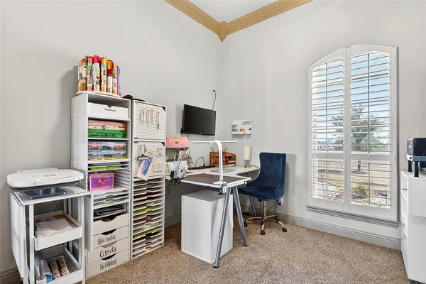 a view of a workspace with furniture