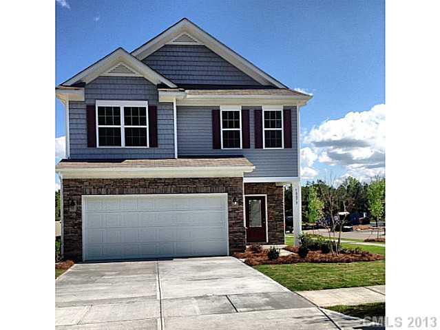 78075 Rillstone Drive Lancaster, SC 29720 - Photo 5 of 5 a front view of a house with garden