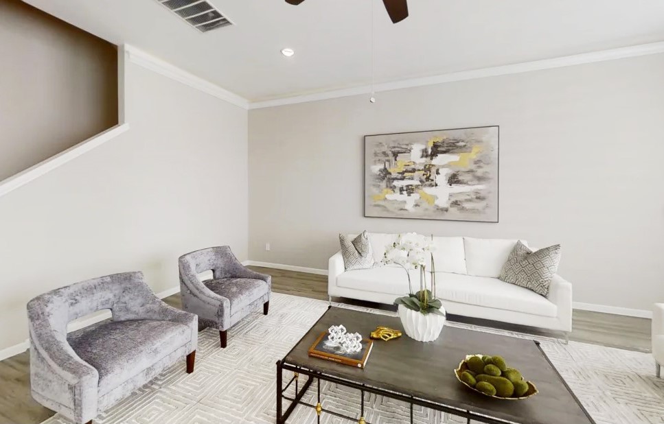 5609 Mina Way Houston, TX 77081 - Photo 6 of 12 a living room with furniture and white walls