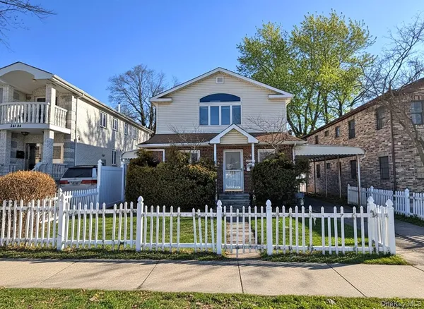 a front view of house with a yard