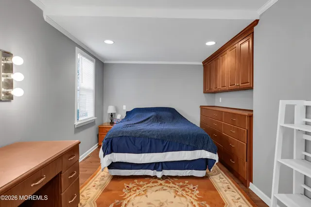 a room with a bed and a window