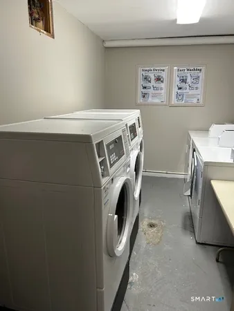 a utility room with dryer and washer