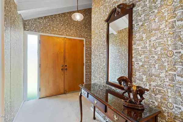 a view of a room with a window