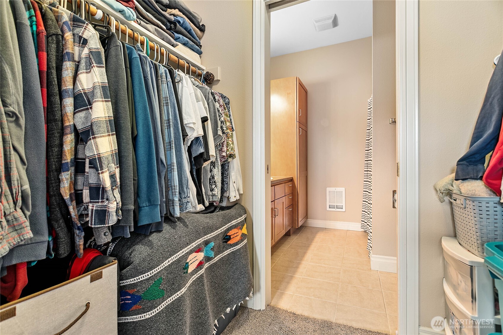 1991 Alder Street, Unit 204 Ferndale, WA 98248 - Photo 14 of 27 a view of walk in closet with clothes and shoes