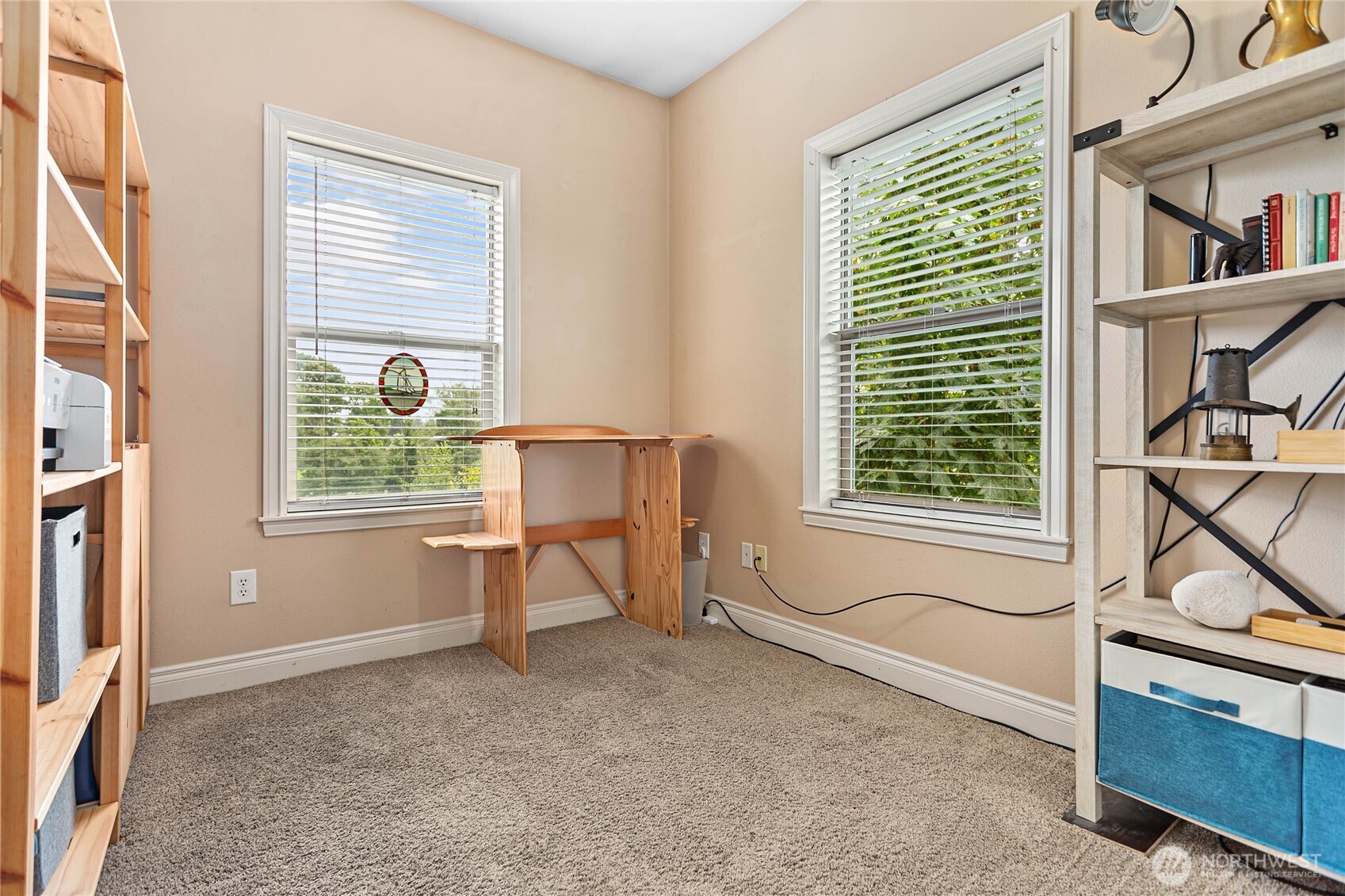 1991 Alder Street, Unit 204 Ferndale, WA 98248 - Photo 18 of 27 a view of a workspace with furniture and a window