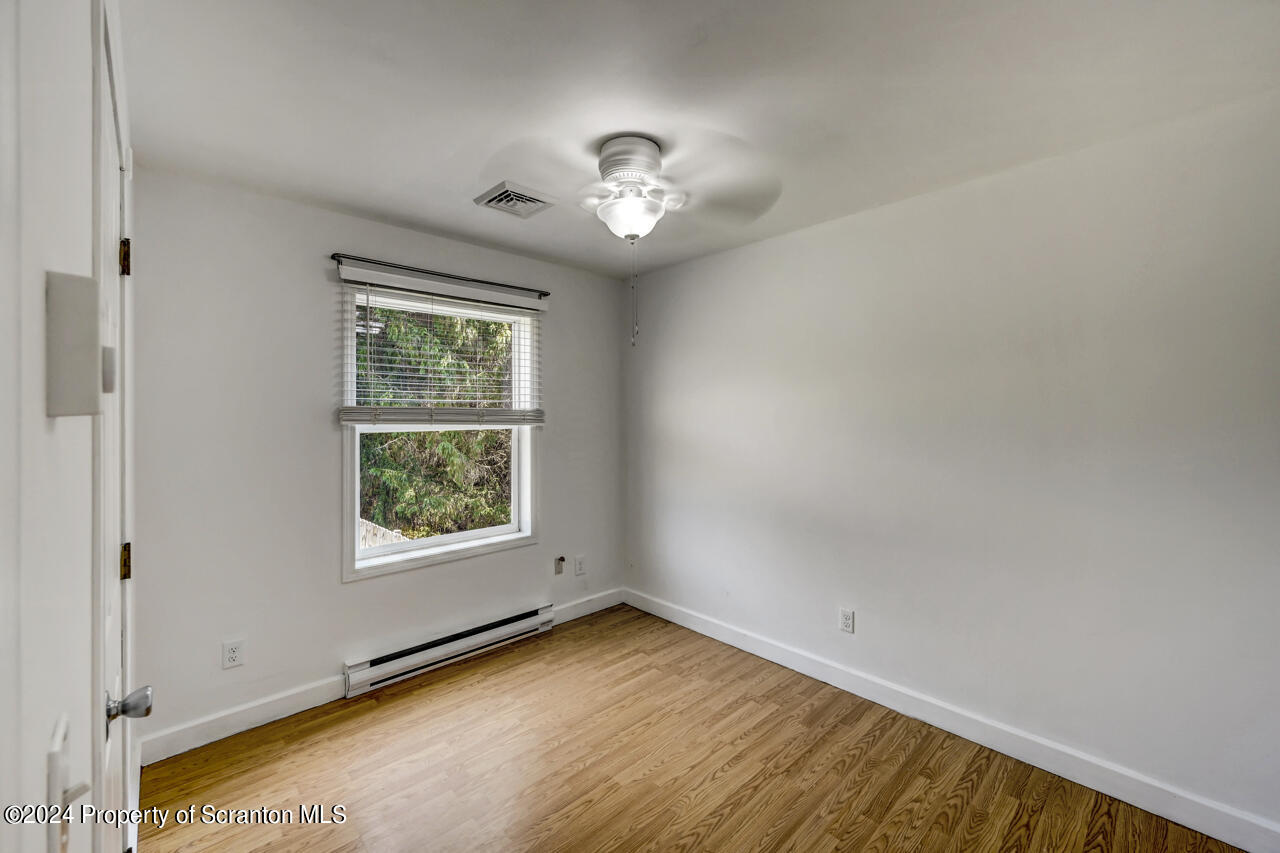 104 Bowens Road Moscow, PA 18444 - Photo 16 of 48 an empty room with a window