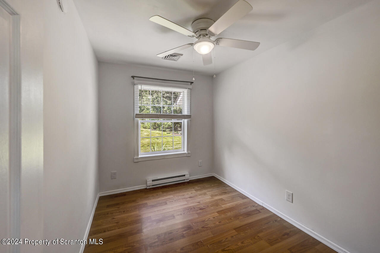 104 Bowens Road Moscow, PA 18444 - Photo 22 of 48 an empty room with a window