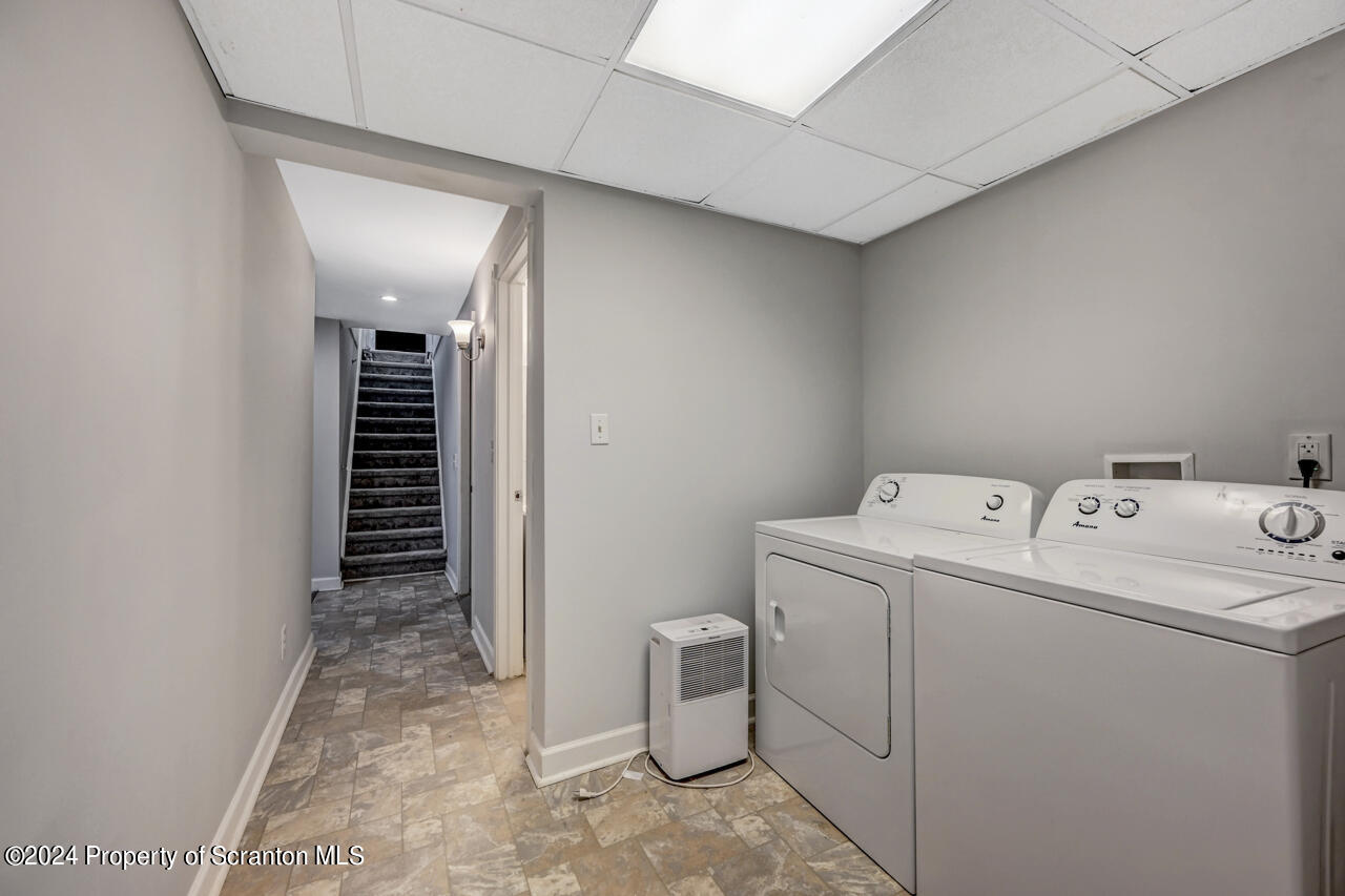 104 Bowens Road Moscow, PA 18444 - Photo 41 of 48 a view of storage room with washer and dryer