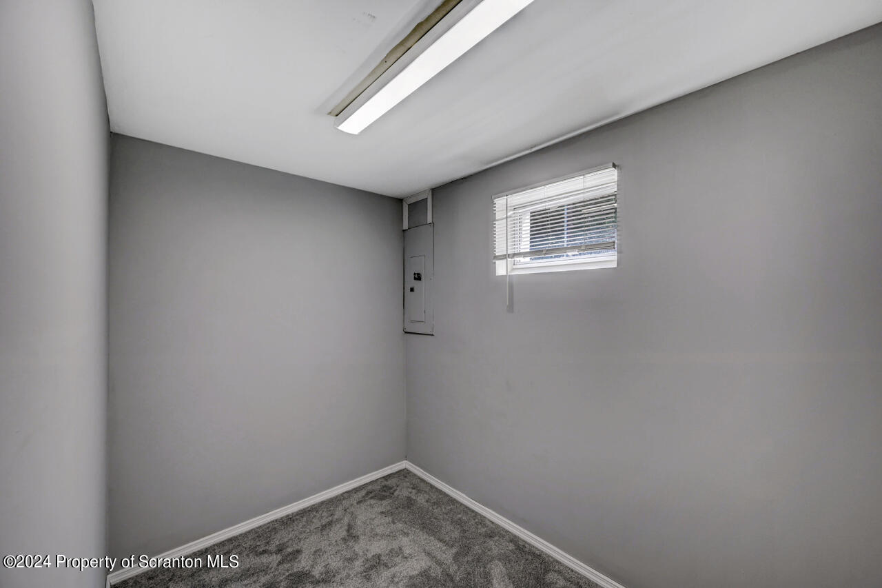 104 Bowens Road Moscow, PA 18444 - Photo 42 of 48 a view of a hallway with a window