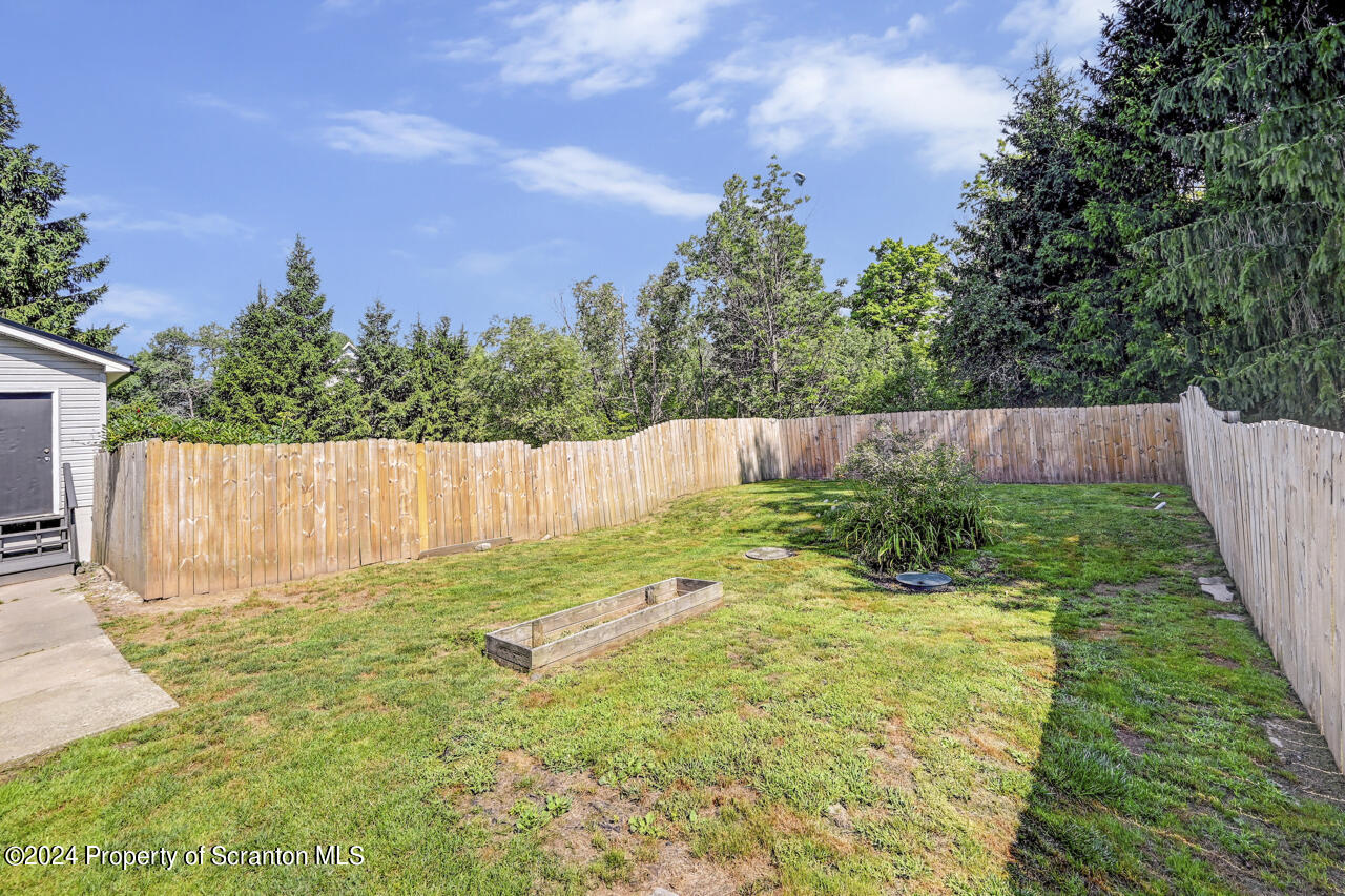 104 Bowens Road Moscow, PA 18444 - Photo 46 of 48 a backyard of a house with lots of green space