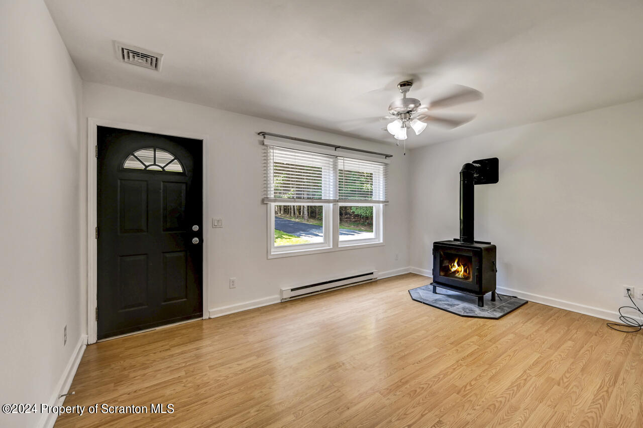 104 Bowens Road Moscow, PA 18444 - Photo 7 of 48 a living room with furniture and a window