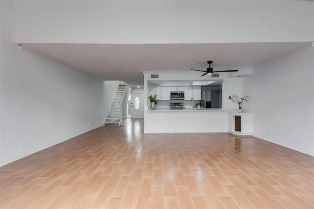 a view of entryway with wooden floor