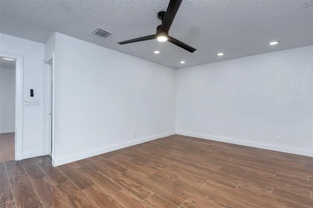 a bathroom with a sink toilet a mirror and shower