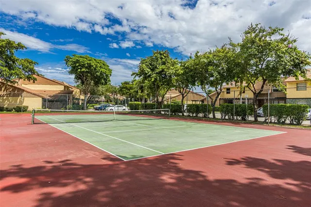 a sign that is on a brick wall