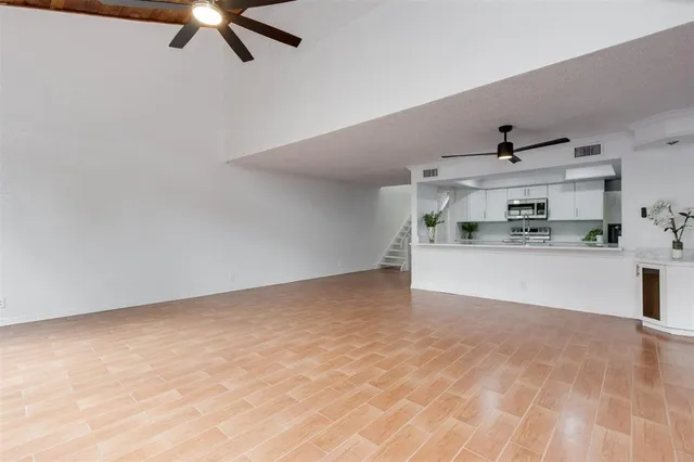 a view of a kitchen with a sink