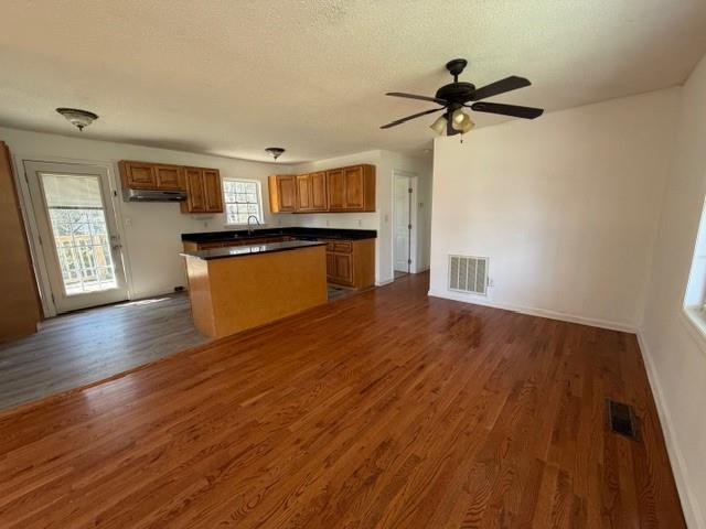 425 Chubbtown Road Cedartown, GA 30125 - Photo 12 of 29 a view of empty room with wooden floor and fan