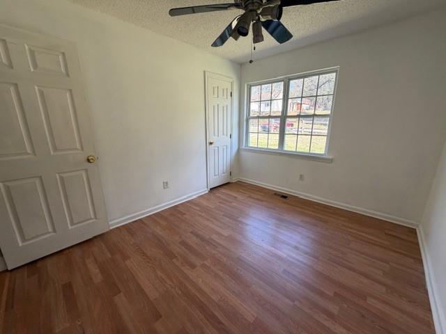 425 Chubbtown Road Cedartown, GA 30125 - Photo 23 of 29 a view of empty room with wooden floor and fan