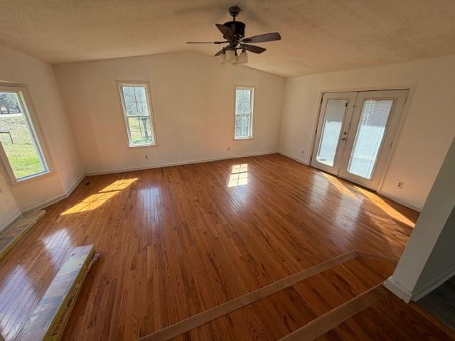 425 Chubbtown Road Cedartown, GA 30125 - Photo 8 of 29 a view of an empty room with wooden floor and a window