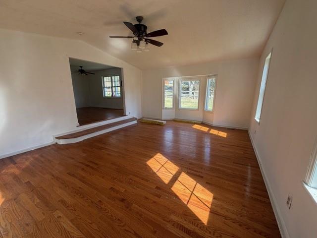 425 Chubbtown Road Cedartown, GA 30125 - Photo 10 of 29 a view of an empty room with window and wooden floor
