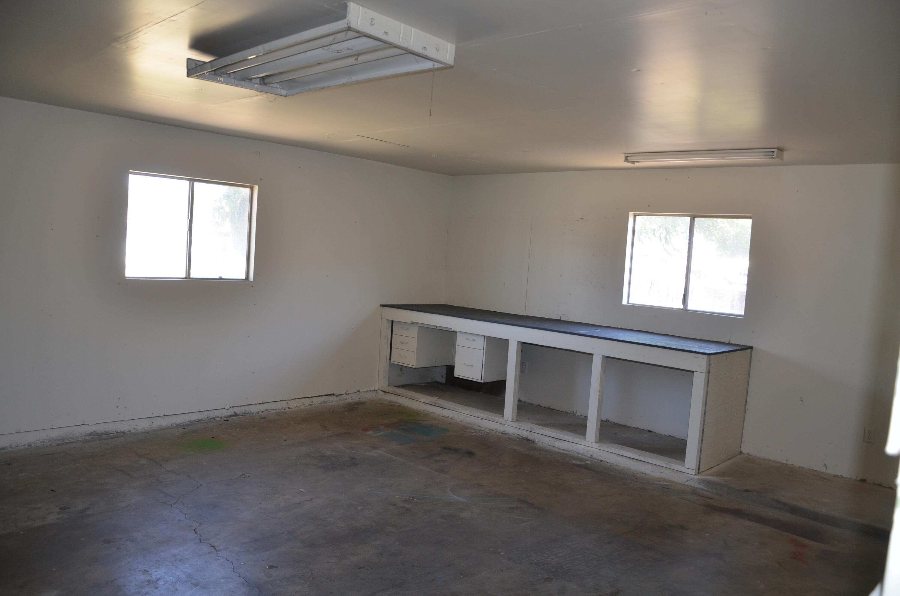 339 West Spring Lane Lemoore, CA 93245 - Photo 13 of 31 an empty room with windows