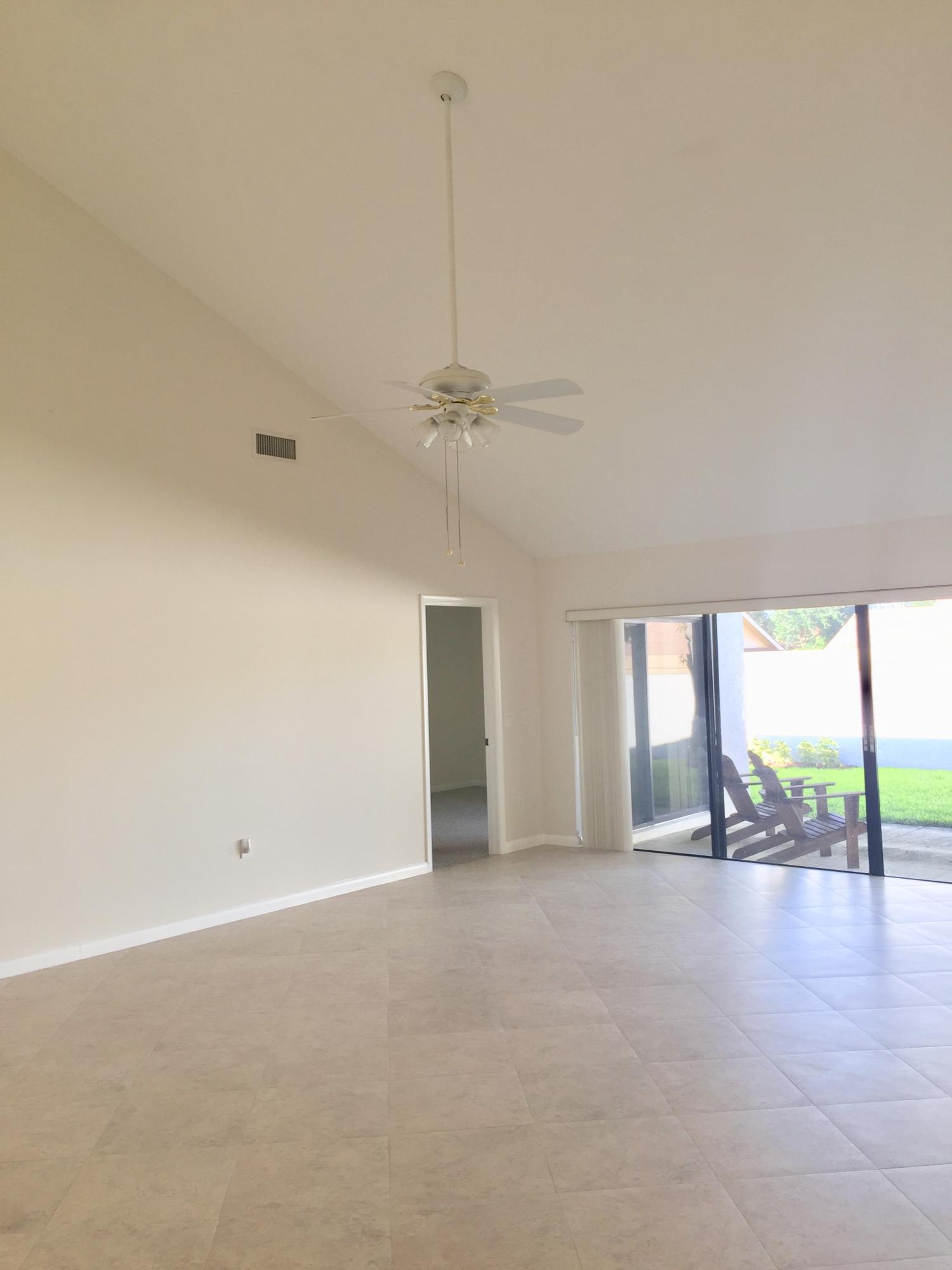 310 Ridge Road Jupiter, FL 33477 - Photo 4 of 37 Open living area with high ceilings