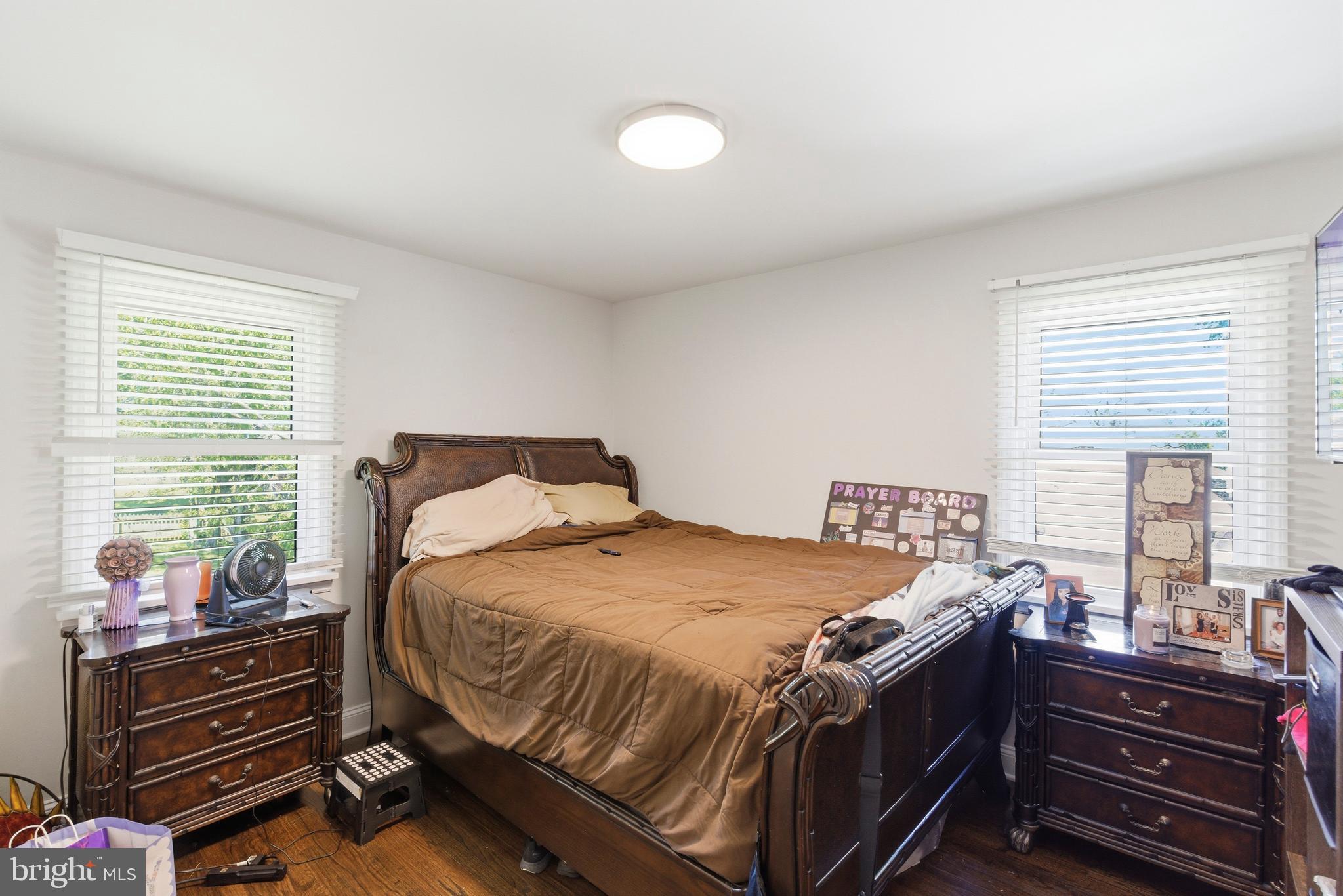 912 Shelley Road Towson, MD 21286 - Photo 19 of 27 a bedroom with a bed and windows