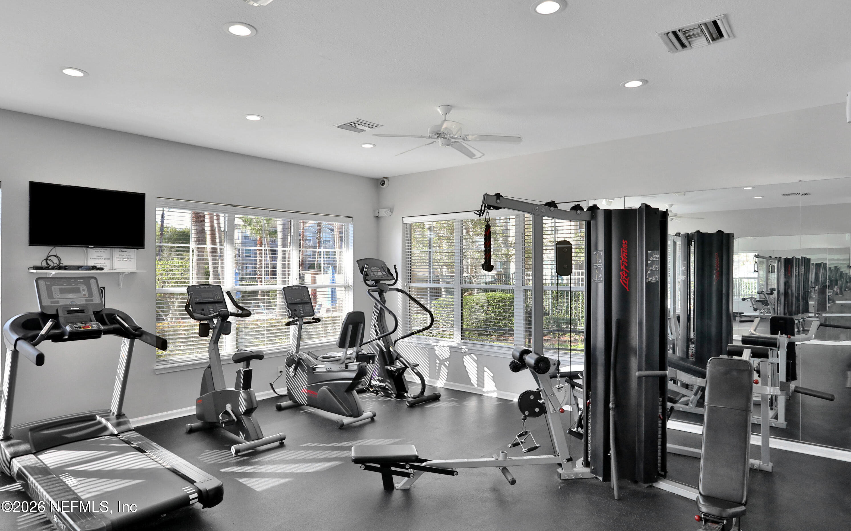 7990 Baymeadows Road East, Unit 912 Jacksonville, FL 32256 - Photo 23 of 25 a view of a room with gym equipment