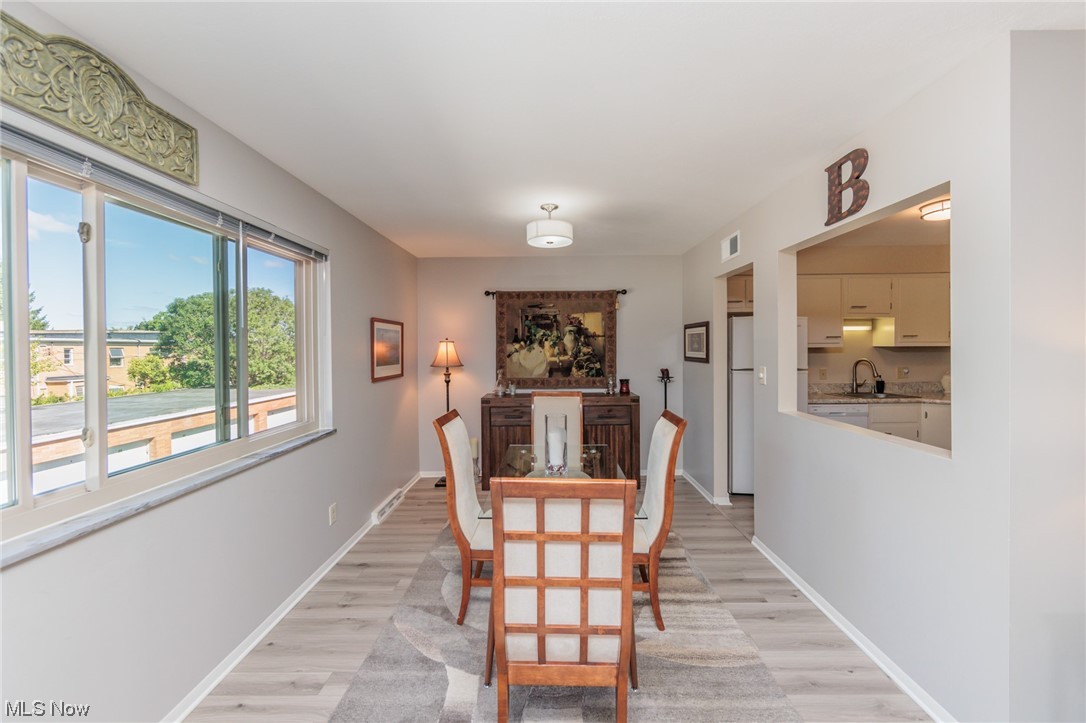 1750 Wagar Road, Unit 206 Rocky River, OH 44116 - Photo 9 of 33 Dining area with light hardwood floors