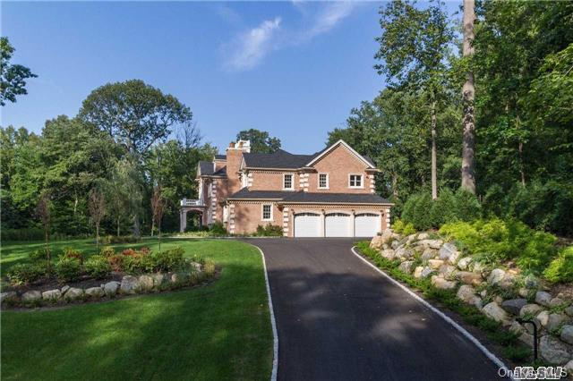55 Old Tappan Road Locust Valley, NY 11560 - Photo 1 of 1 a front view of a house with a yard