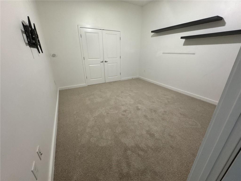 250 Pharr Road Northeast, Unit 601 Atlanta, GA 30305 - Photo 14 of 34 a view of small space with racks on the wall