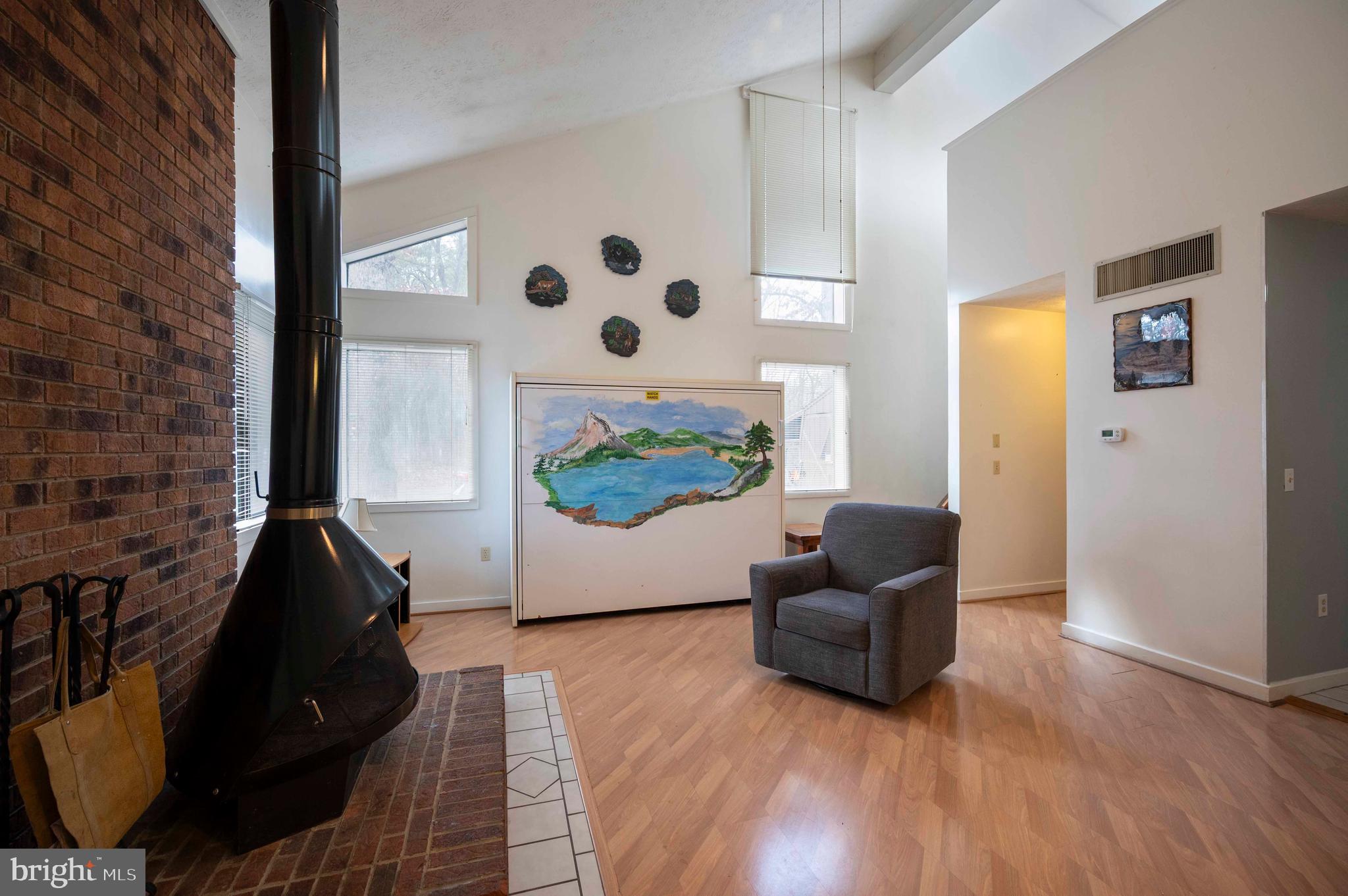 377 Spitz Lane, Unit 100 Basye, VA 22810 - Photo 44 of 69 a living room with furniture and a large window