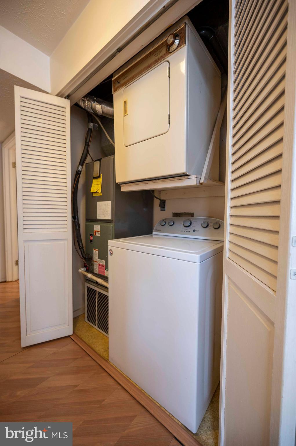377 Spitz Lane, Unit 100 Basye, VA 22810 - Photo 52 of 69 a utility room with dryer and washer