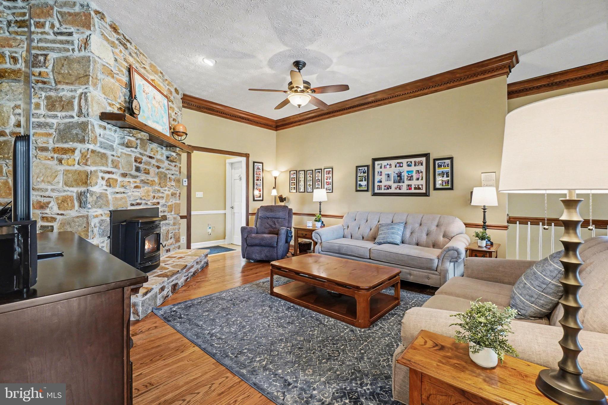 2309 Kings Arms Drive Fallston, MD 21047 - Photo 15 of 89 a living room with furniture and a fireplace