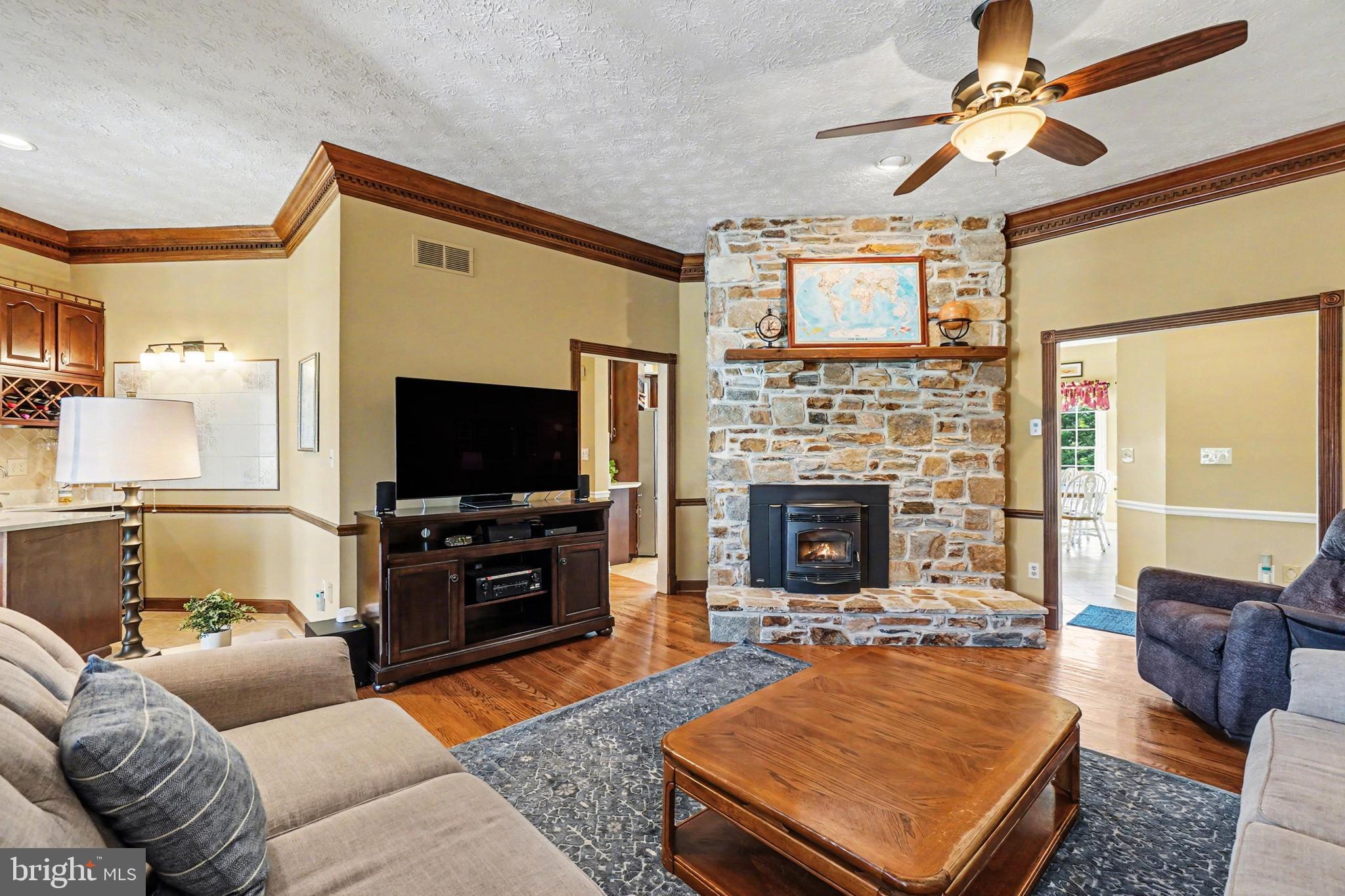2309 Kings Arms Drive Fallston, MD 21047 - Photo 16 of 89 Family room with stone fireplace