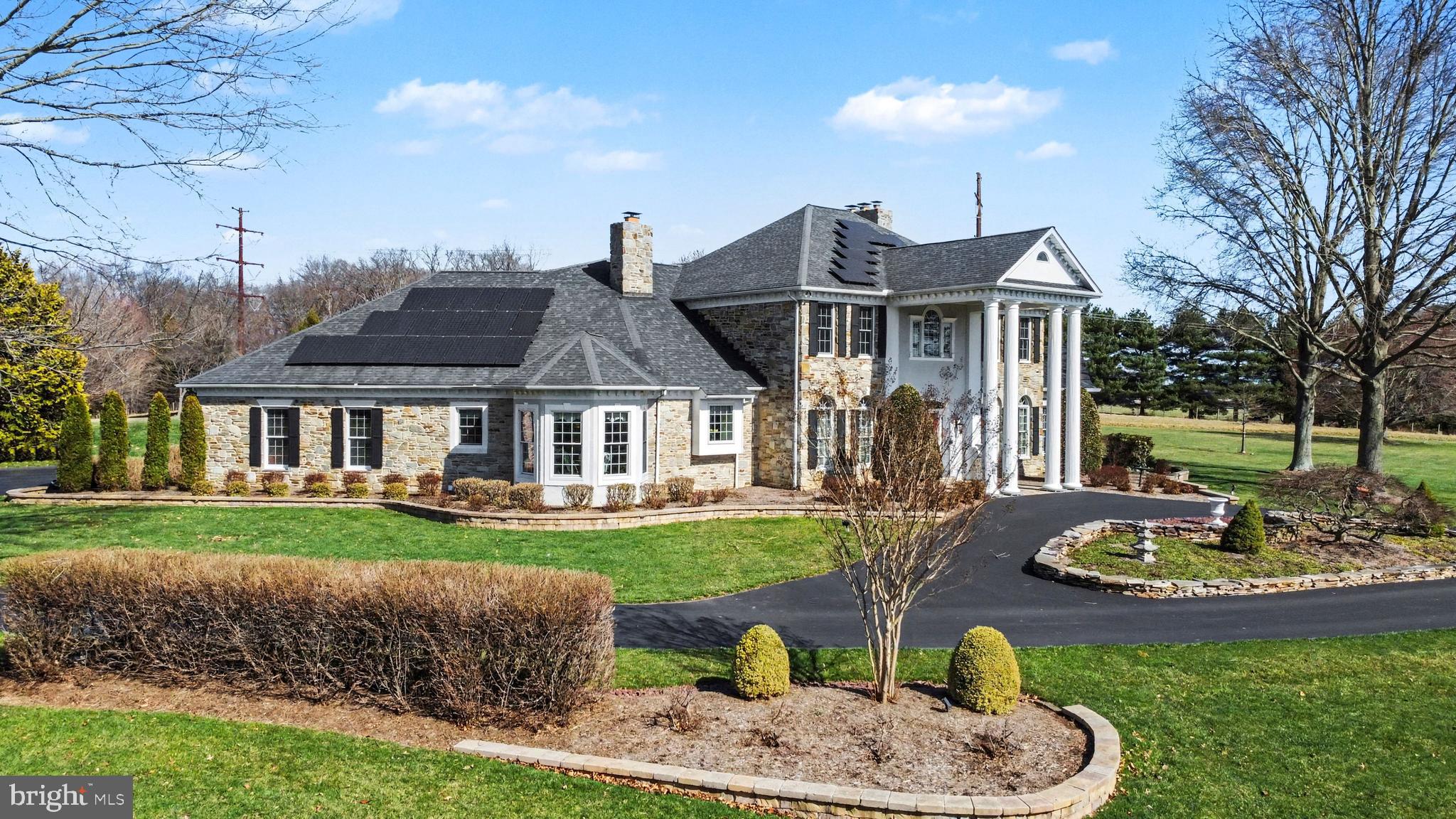 2309 Kings Arms Drive Fallston, MD 21047 - Photo 2 of 89 a front view of a house with a garden and patio