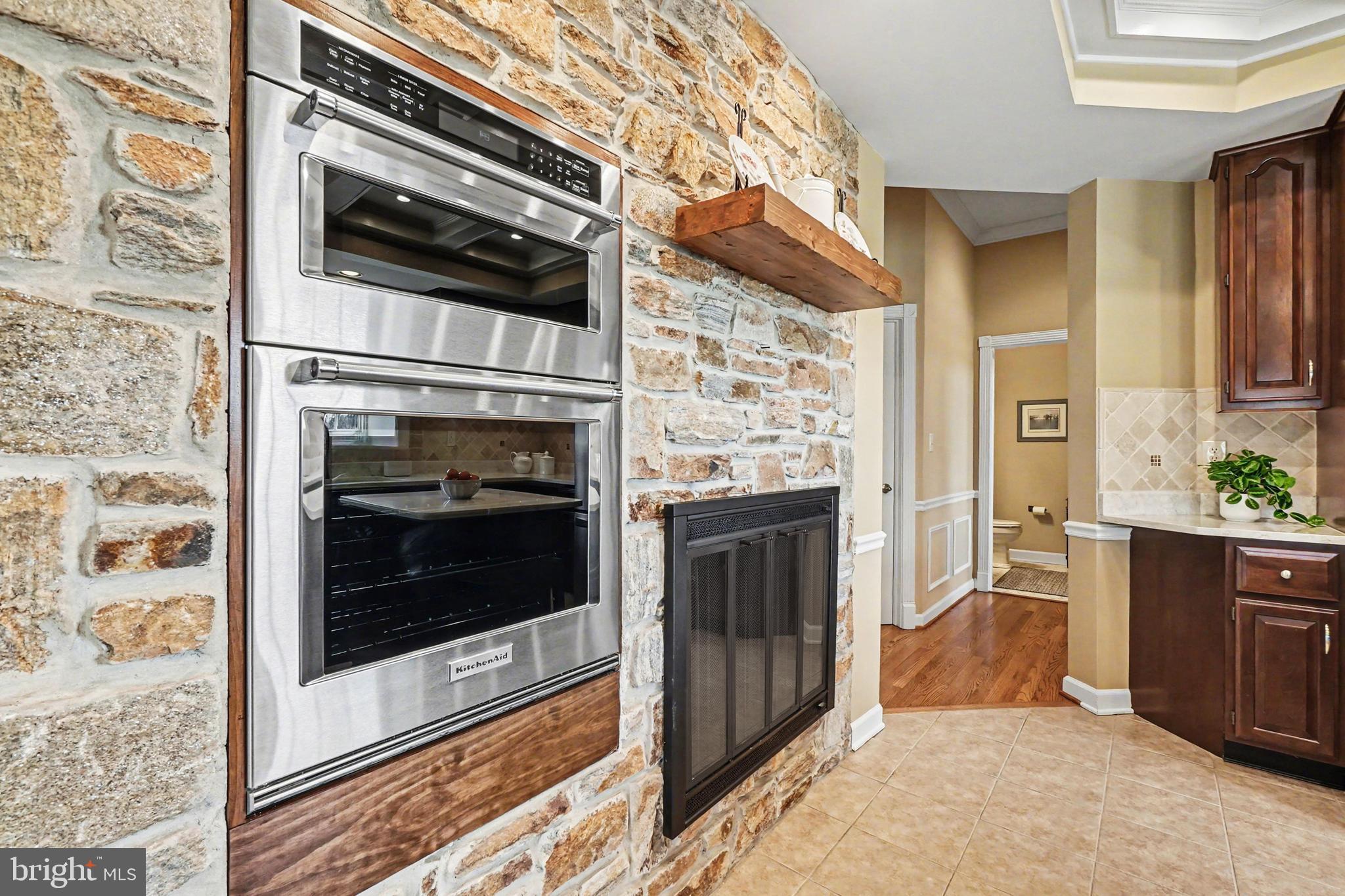 2309 Kings Arms Drive Fallston, MD 21047 - Photo 24 of 89 a kitchen with a stove and a microwave