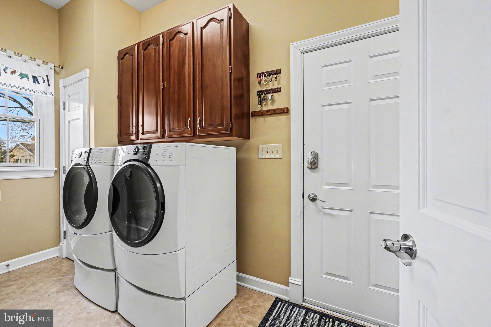 2309 Kings Arms Drive Fallston, MD 21047 - Photo 28 of 89 a utility room with dryer and washer