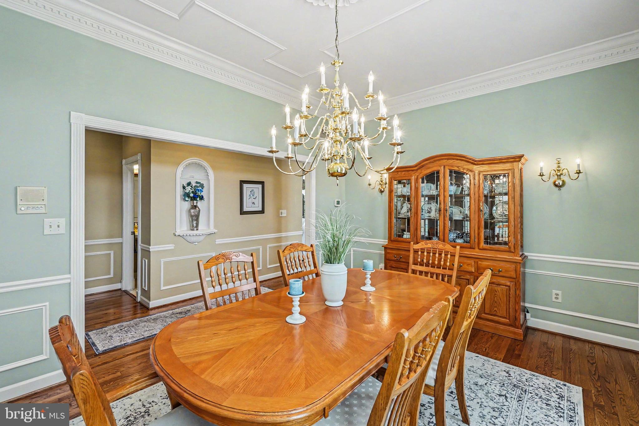 2309 Kings Arms Drive Fallston, MD 21047 - Photo 30 of 89 a dining room with furniture a chandelier and wooden floor