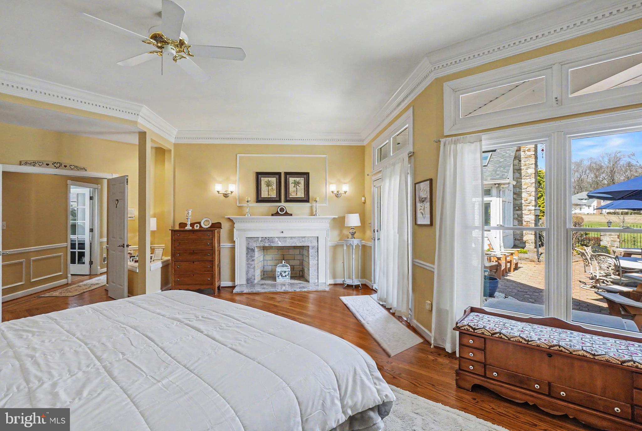 2309 Kings Arms Drive Fallston, MD 21047 - Photo 35 of 89 a spacious bedroom with a bed and a chandelier