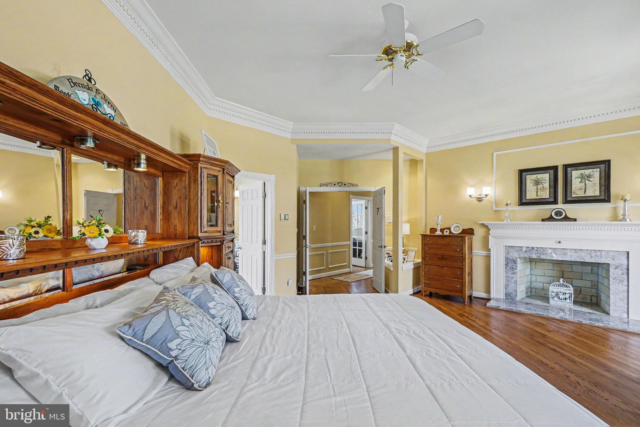 2309 Kings Arms Drive Fallston, MD 21047 - Photo 36 of 89 a bedroom with furniture and a fireplace