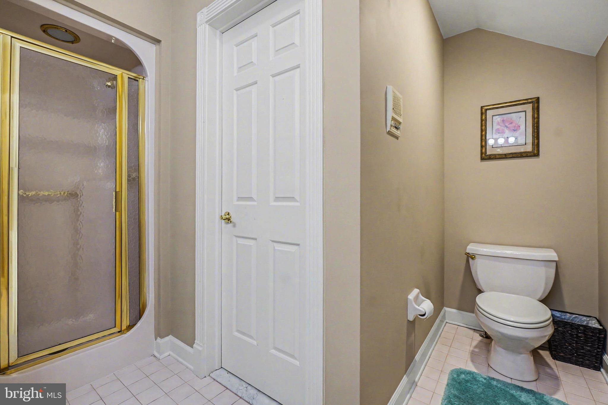 2309 Kings Arms Drive Fallston, MD 21047 - Photo 53 of 89 a white toilet sitting next to a bathroom sink