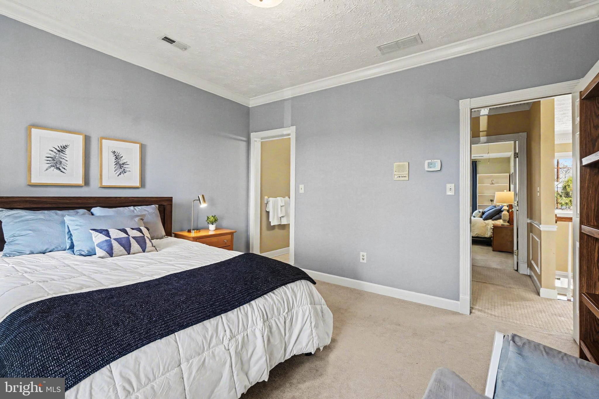 2309 Kings Arms Drive Fallston, MD 21047 - Photo 55 of 89 a bedroom with a bed and painting on the wall