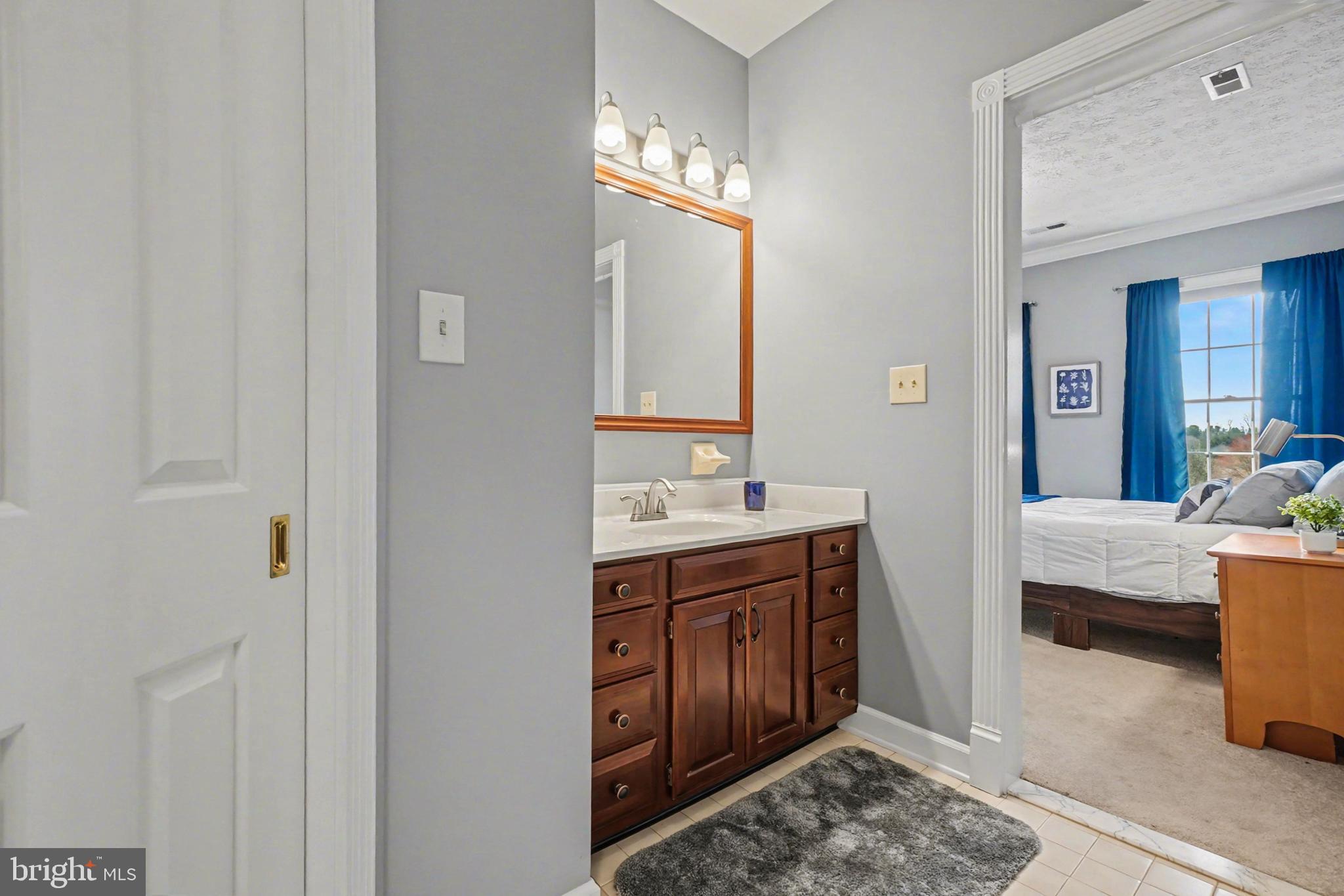 2309 Kings Arms Drive Fallston, MD 21047 - Photo 57 of 89 a spacious bathroom with a tub sink and mirror