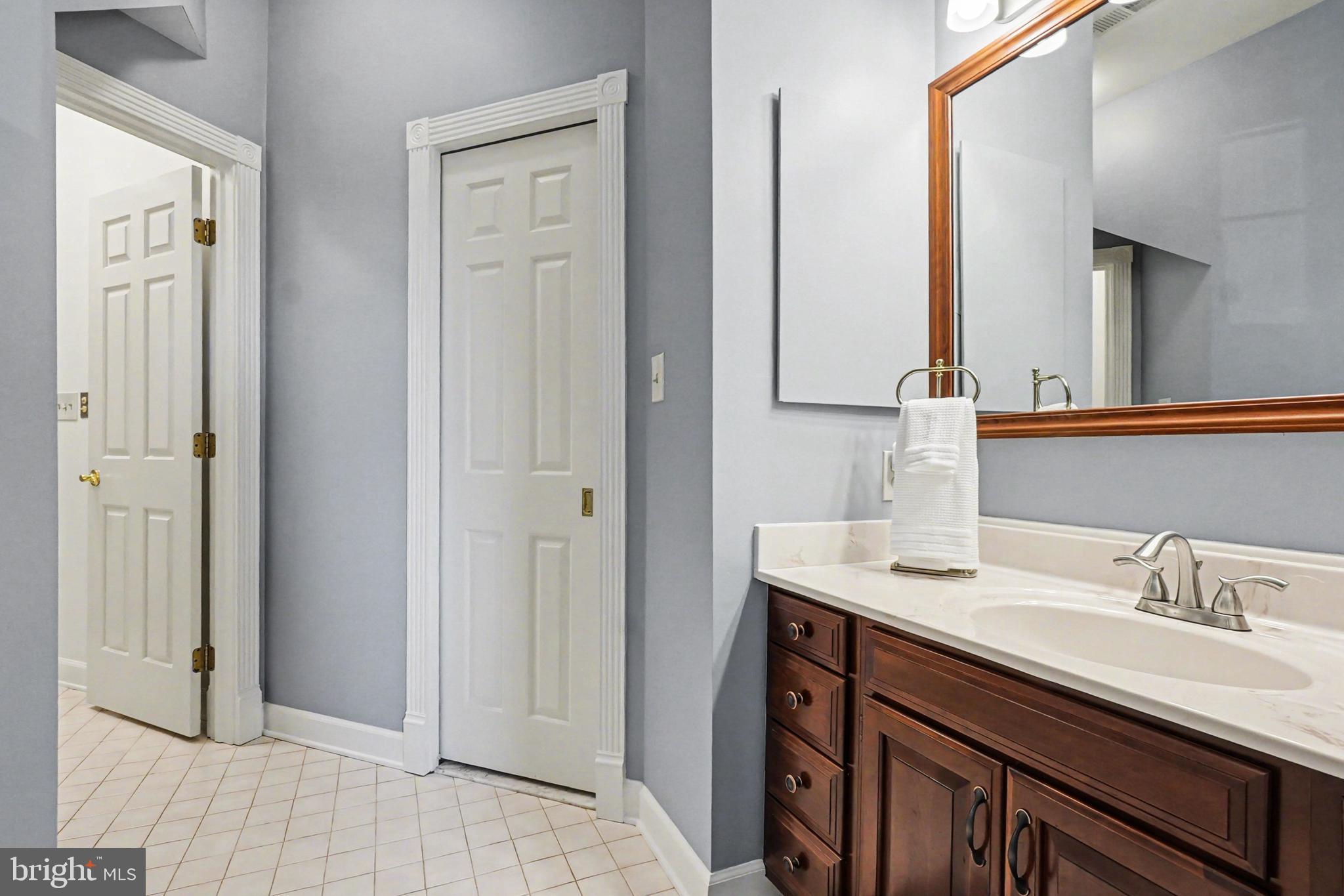2309 Kings Arms Drive Fallston, MD 21047 - Photo 58 of 89 a bathroom with a sink and a mirror