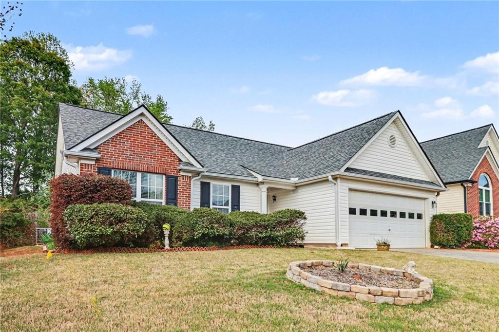 304 Allegheny Avenue Dallas, GA 30132 - Photo 2 of 30 front view of a house with a yard