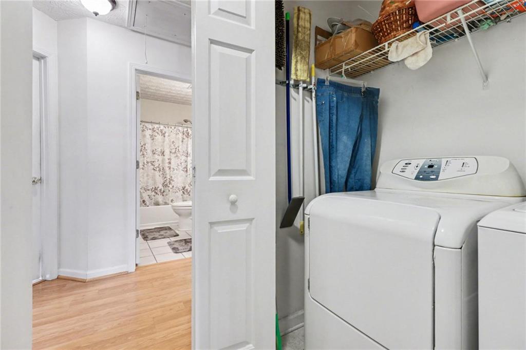 304 Allegheny Avenue Dallas, GA 30132 - Photo 25 of 30 a utility room with dryer and washer