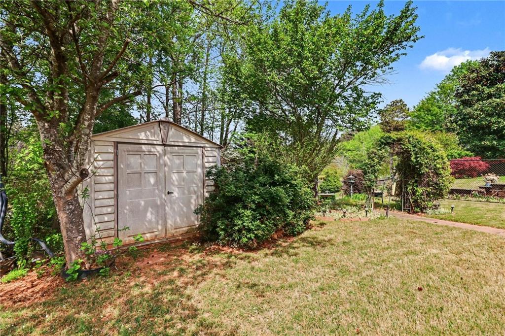 304 Allegheny Avenue Dallas, GA 30132 - Photo 29 of 30 a backyard of a house with lots of green space