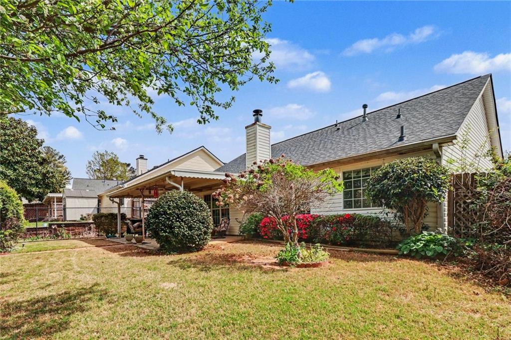 304 Allegheny Avenue Dallas, GA 30132 - Photo 4 of 30 a front view of a house with a yard and a table