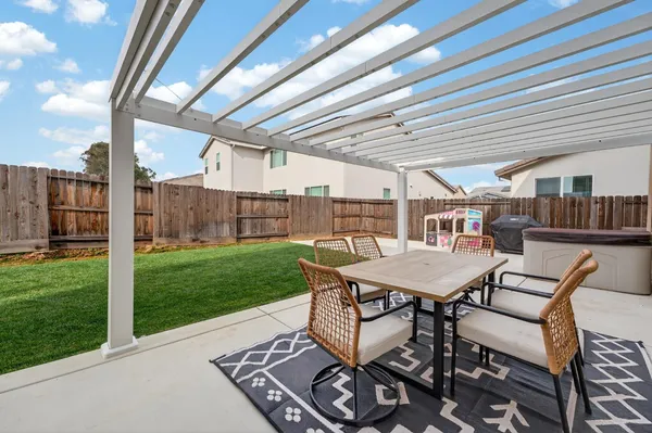 a view of a house with a sink and a yard